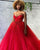 Red Voluminous Ball Gown