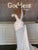 Solemn Charm White Gown